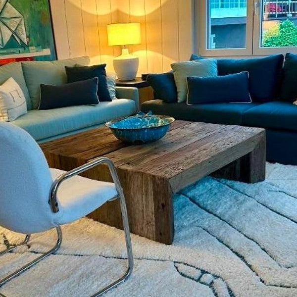 Neutral cream Moroccan Beni Ourain wool rug styled in a modern living room