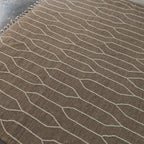 Video of the taupe and ivory kilim rug, showing the flat weave up close