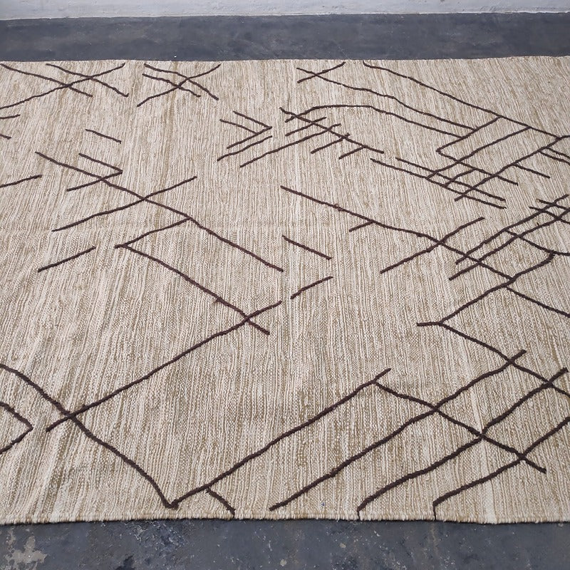 Moroccan Kilim rug at an angle, highlighting the minimalist geometric line pattern